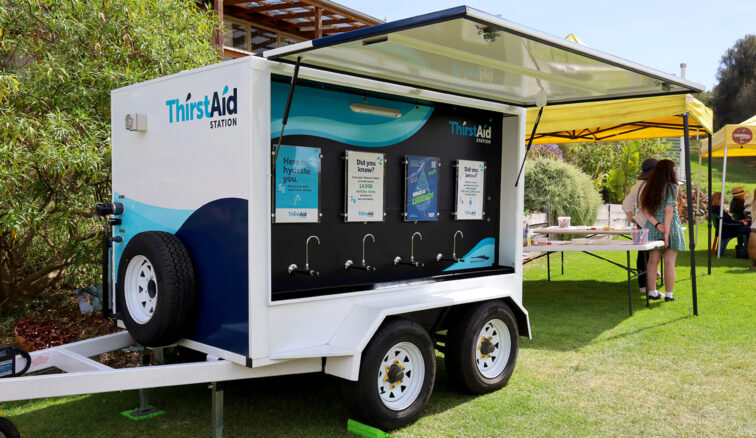 Water Trialier, Thirst Aid Station, Outdoor, grass, tree, community